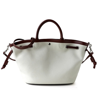 Sac seau en cuir et en toile – élégance décontractée 2025