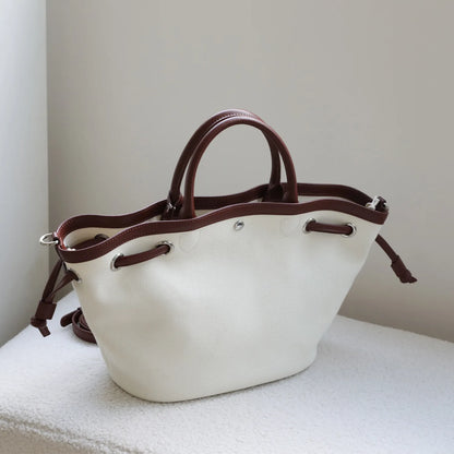 Sac seau en cuir et en toile – élégance décontractée 2025