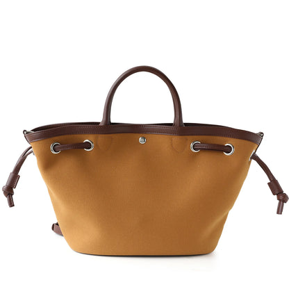 Sac seau en cuir et en toile – élégance décontractée 2025