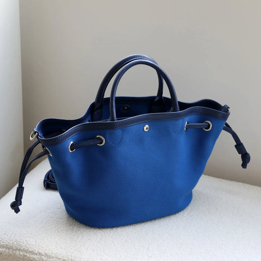 Sac seau en cuir et en toile – élégance décontractée 2025